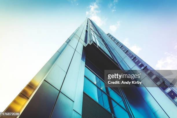 low angle view of heron tower, london, england, uk - heron tower stock pictures, royalty-free photos & images