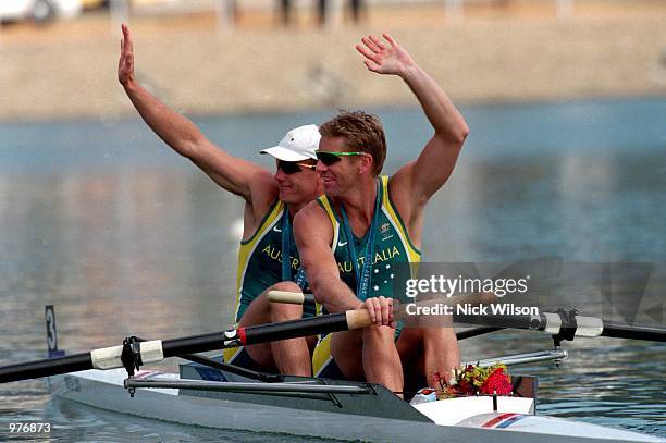 Matthew Long and James Tomkins of Australia wave to the crowd after competiting in the Men's Coxless Pair's held at the Sydney International Regatta...