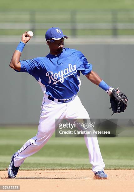 Infielder Wilson Betemit of the Kansas City Royals fields a ground ball out against the Los Angeles Angels of Anaheim during the MLB spring training...