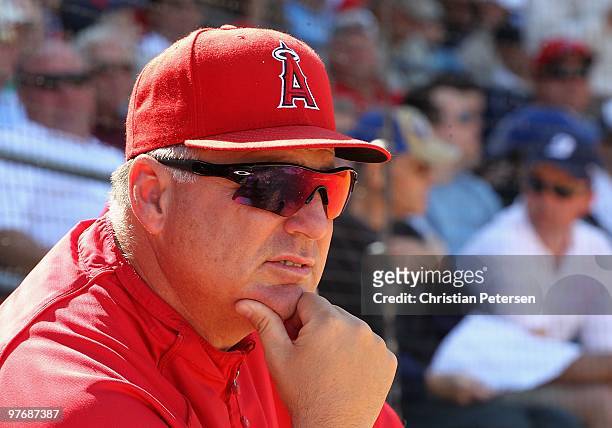 Manager Mike Scioscia of the Los Angeles Angels of Anaheim looks on during the MLB spring training game against the Kansas City Royals at Surprise...