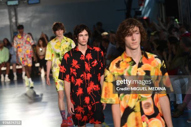 Models present a creation by MSGM during the men & women's spring/summer 2019 collection fashion show in Milan, on June 17, 2018.