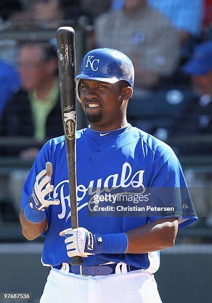 Wilson Betemit of the Kansas City Royals prepares to bat against the Los Angeles Angels of Anaheim during the MLB spring training game at Surprise...