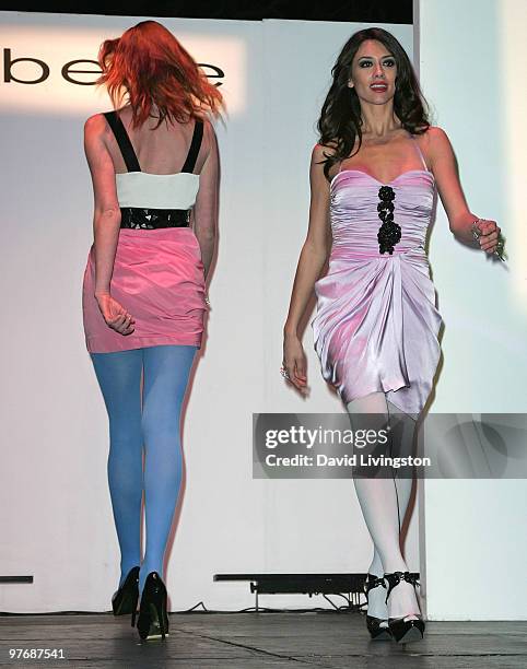 Models walk the runway at a sneak preview for the bebe-Kardashians Capsule Collection at The Grove on March 13, 2010 in Los Angeles, California.