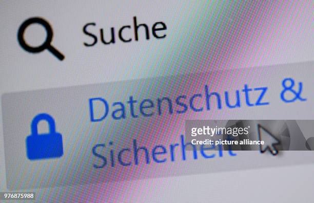 April 2018, Germany, Sieversdorf: The words 'Datenschutz und Sicherheit' can be seen on an internet page . The new General Data Protection Regulation...