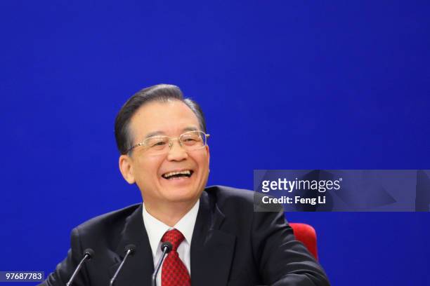 China's Premier Wen Jiabao answers a question during his annual press conference after the closing of the National People's Congress held at the...