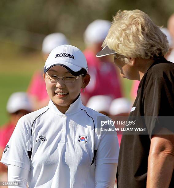 Leading amatuer Kim Hyun-Soo of South Korea is congratulated by Laura Davies of England after the final round of women's Australian Open golf...