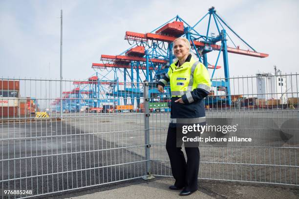 April 2018, Germany, Hamburg: Angela Titzrath, CEO of Hamburger Hafen und Logistik AG , stands next to the Containerterminal Altenwerder during a...