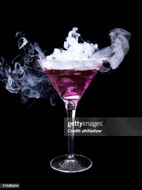 smoking purple martini - dry ice black background stock pictures, royalty-free photos & images