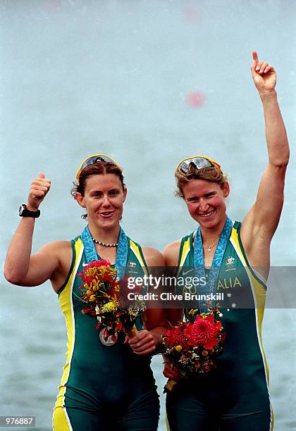 Rachael Taylor and Kate Slatter of Australia celebrate their silver medal during the Women's Coxless Pair Final held at the Sydney International...