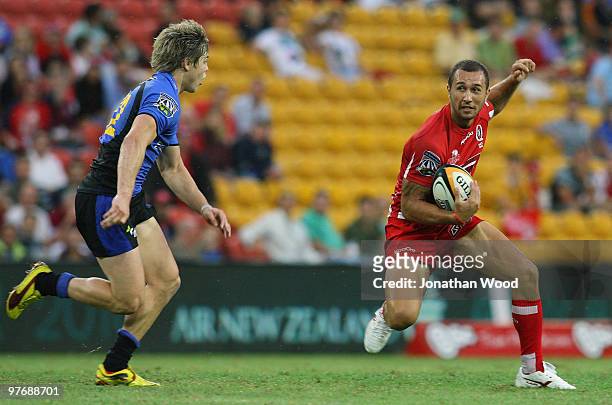 Quade Cooper of the Reds in attack during the round five Super 14 match between the Reds and the Western Force at Suncorp Stadium on March 14, 2010...