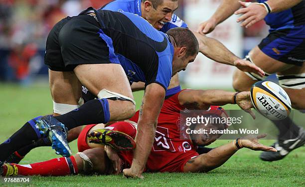 Digby Ioane of the Reds releases the ball during the round five Super 14 match between the Reds and the Western Force at Suncorp Stadium on March 14,...