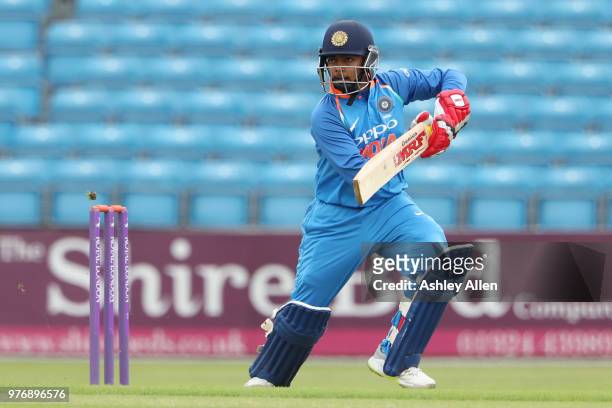 Prithvi Shaw of India A guides the ball through the offside during a tour match between ECB XI v India A at Headingley on June 17, 2018 in Leeds,...