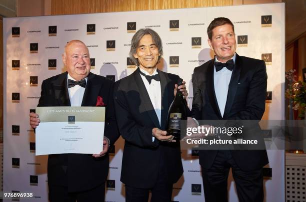 April 2018, Hamburg, Germany: Guenter Schoeneis, founder of the award and panel member , award winner Kent Nagano, and Christian Josephi, host and...