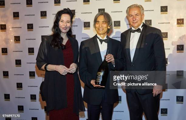 April 2018, Hamburg, Germany: Music critic Julia Spinola , the award winner Kent Nagano, and presenter and former mayor of Berlin, Klaus Wowereit,...