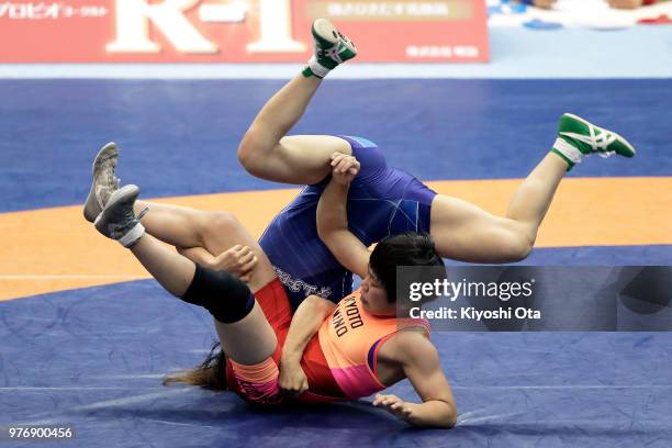 Miu Shimizu competes against Kika Kagata in the Women's 50kg first round match on day four of the All Japan Wrestling Invitational Championships at...