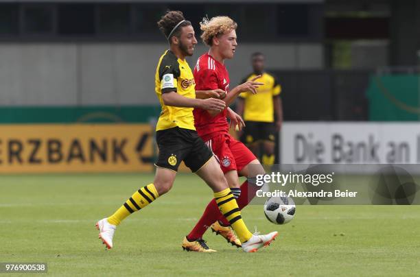 Benedict Hollerbach of FC Bayern Muenchen fights for the ball with Alaa Bakir of Borussia Dortmund during the B Juniors German Championship final...