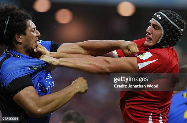 Rob Simmons of the Reds clashes with Sam Wykes of the Force during the round five Super 14 match between the Reds and the Western Force at Suncorp...