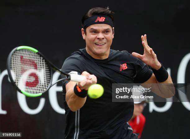 Milos Raonic of Canada plays a forehand to Roger Federer of Switzerland during the final match on day 7 of the Mercedes Cup at Tennisclub Weissenhof...