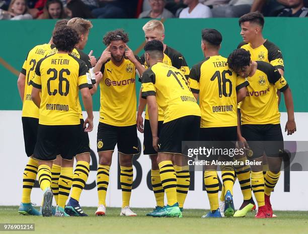 Alaa Bakir of Borussia Dortmund gestures as he talks to his teammates during the B Juniors German Championship final between FC Bayern Muenchen U17...