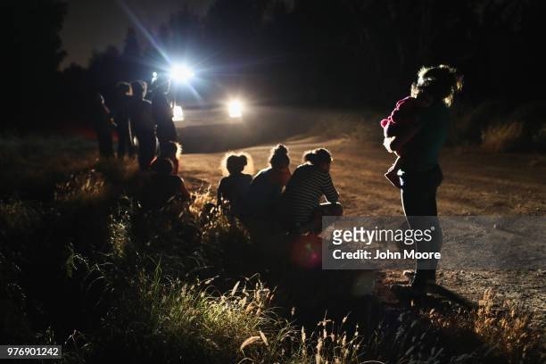 Border Patrol agents arrive to detain a group of Central American asylum seekers near the U.S.-Mexico border on June 12, 2018 in McAllen, Texas. The...