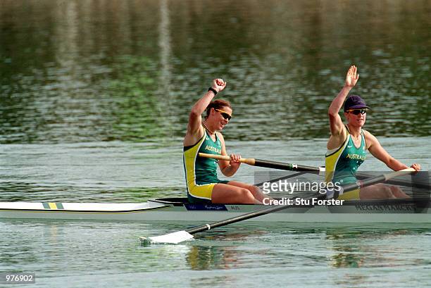 Rachael Taylor and Kate Slatter of Australia celebrate their silver medal during the Women's Coxless Pair Final held at the Sydney International...