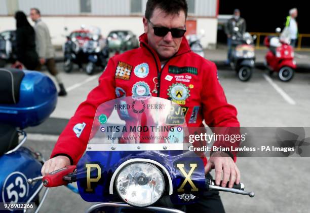 Vespa enthusiasts arrive for the gala dinner in Belfast as thousands of Vespa scooter drivers have descended on Northern Ireland as part of the Vespa...