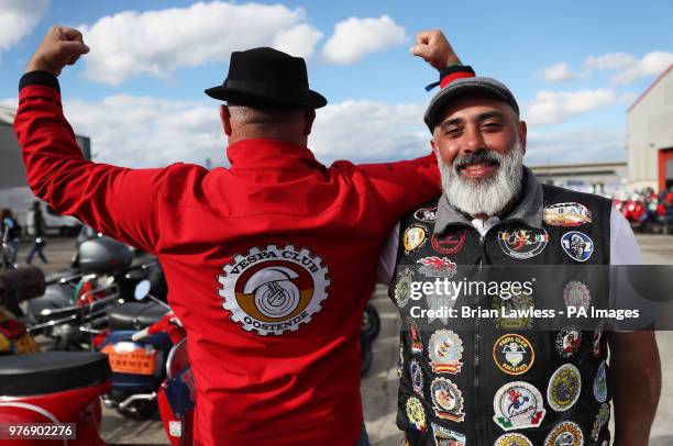 Vespa enthusiasts arrive for the gala dinner in Belfast as thousands of Vespa scooter drivers have descended on Northern Ireland as part of the Vespa...