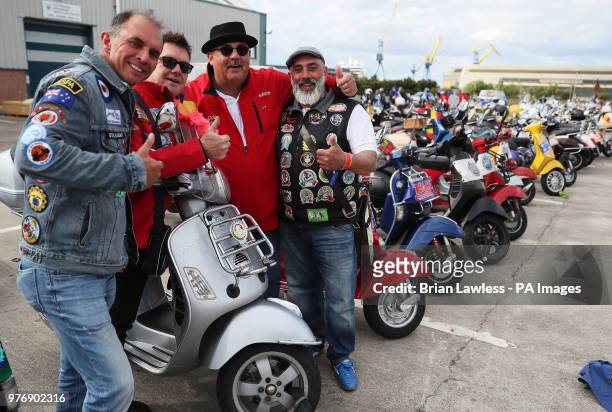 Vespa enthusiasts arrive for the gala dinner in Belfast as thousands of Vespa scooter drivers have descended on Northern Ireland as part of the Vespa...