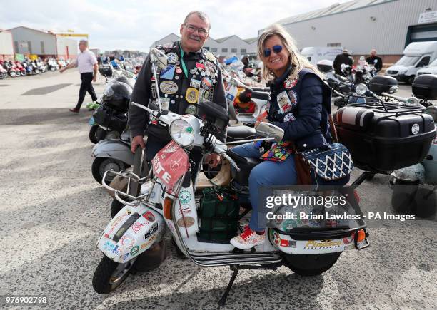 Mario Pecarari and Sandra Carozzi arrive for the gala dinner in Belfast as thousands of Vespa scooter drivers have descended on Northern Ireland as...