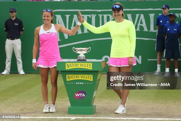 Alicja Rosolska of Poland and Abigail Spears of USA with the winners trophy for the WTA Doubles final during Day Nine of the Nature Valley open at...
