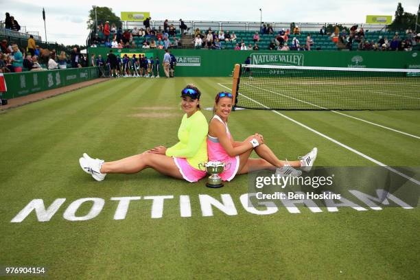 Alicja Rosolska of Poland and Abigail Spears of USA celebrate victory in the Womens Doubles Final during Day Nine of the Nature Valley Open at...