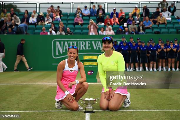 Alicja Rosolska of Poland and Abigail Spears of USA celebrate victory in the Womens Doubles Final during Day Nine of the Nature Valley Open at...