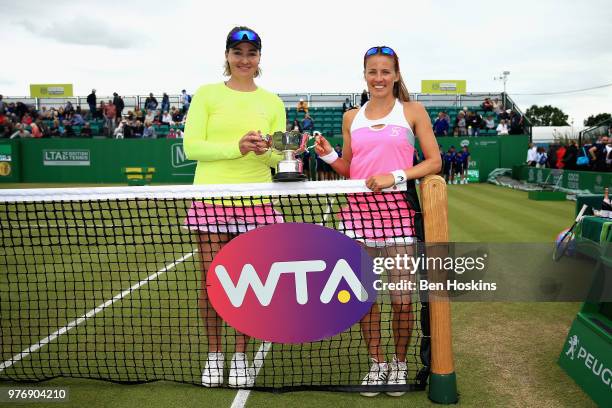 Alicja Rosolska of Poland and Abigail Spears of USA celebrate victory in the Womens Doubles Final during Day Nine of the Nature Valley Open at...