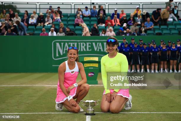 Alicja Rosolska of Poland and Abigail Spears of USA celebrate victory in the Womens Doubles Final during Day Nine of the Nature Valley Open at...