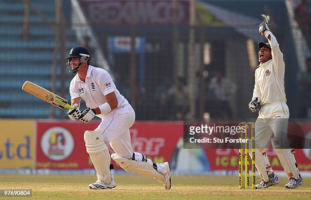 England batsman Kevin Pietersen falls lbw as Bangladesh wicketkeeper Mushfiqur Rahim celebrates during day three of the 1st Test match between...