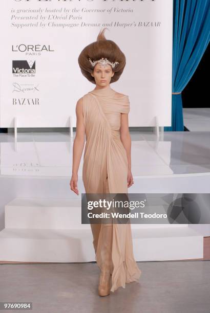 Model wears an outfit by Collette Dinnigan during the Opening Night Party for the 2010 L'Oreal Melbourne Fashion Festival at Government House on...