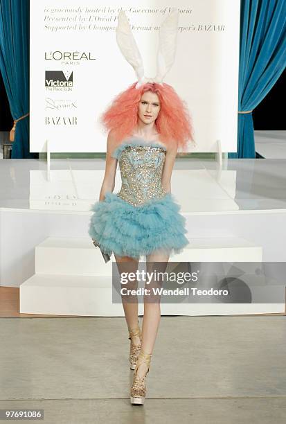 Model wears an outfit by Akira during the Opening Night Party for the 2010 L'Oreal Melbourne Fashion Festival at Government House on March 14, 2010...