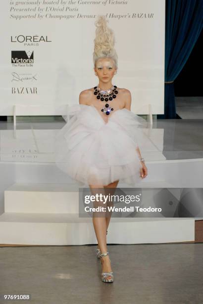 Model wears an outfit by Romance Was Born during the Opening Night Party for the 2010 L'Oreal Melbourne Fashion Festival at Government House on March...