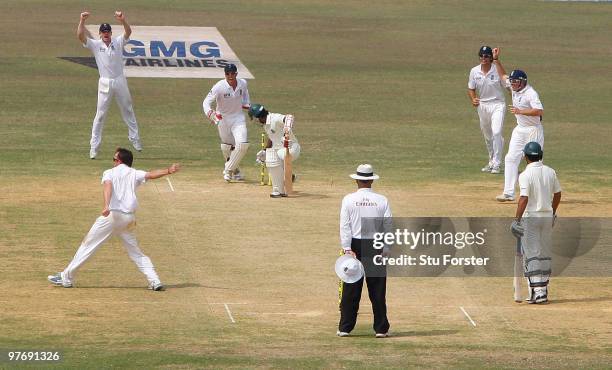 England bowler Graeme Swann celebrates after bowling Bangladesh batsman Rubel Hossain during day three of the 1st Test match between Bangladesh and...