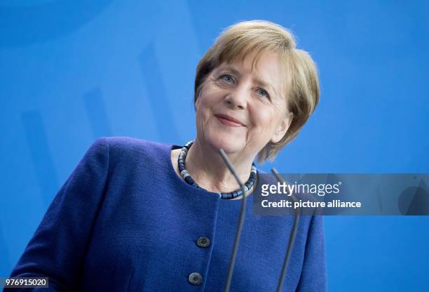 Dpatop - German Chancellor Angela Merkel smiles during a joint press conference with New Zealand's Prime Minister Jacinda Ardern following their...