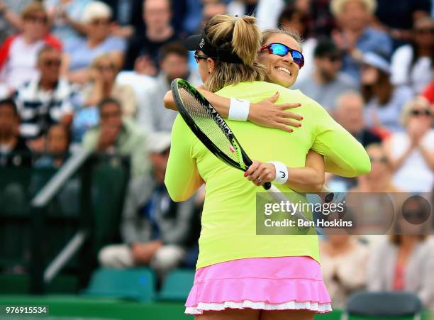 Alicja Rosolska of Poland and Abigail Spears of USA celebrate victory in the Womens Doubles Final during Day Nine of the Nature Valley Open at...