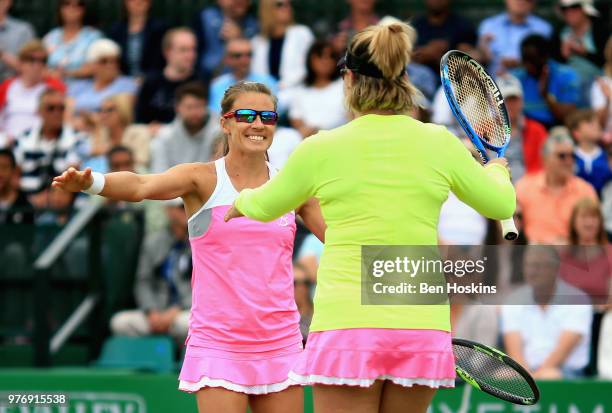 Alicja Rosolska of Poland and Abigail Spears of USA celebrate victory in the Womens Doubles Final during Day Nine of the Nature Valley Open at...