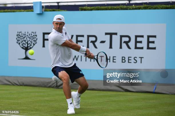 Tim Smyczek of USA hits a backhand during his match against Thanasi Kokkinakis of Australia during qualifying Day 2 of the Fever-Tree Championships...