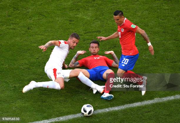 Sergej Milinkovic-Savic of Serbia is challenged by Francisco Calvo and David Guzman of Costa Rica during the 2018 FIFA World Cup Russia group E match...