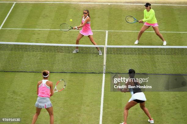 Alicja Rosolska of Poland and Abigail Spears of USA in action against Mihaela Buzarnescu of Romania and Heather Watson of Great Britain in the Womens...