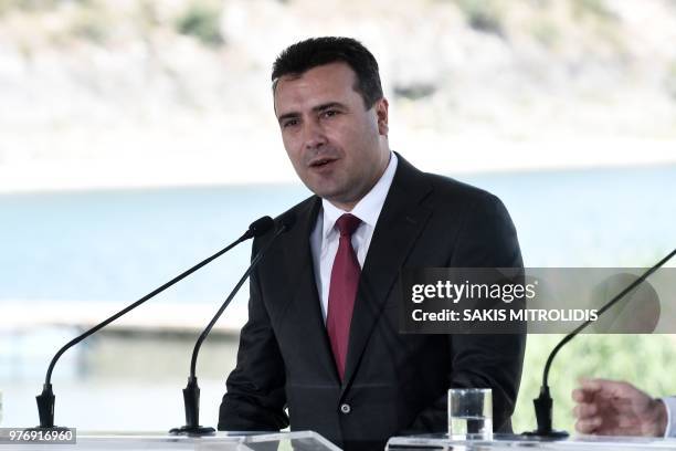 Macedonian Prime Minister Zoran Zaev speak during a signing ceremony between Greece and Macedonia on the shore of the Lake Prespa near Otesevo on...