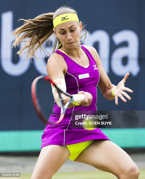 Aleksandra Krunic of Serbia returns a ball to Kirsten Flipkens of Belgium during the finals of the women's singles match at the Libema Open Tennis...