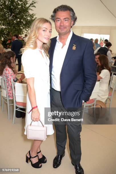 Clara Paget and Laurent Feniou attend the Cartier Queen's Cup Polo Final at Guards Polo Club on June 17, 2018 in Egham, England.