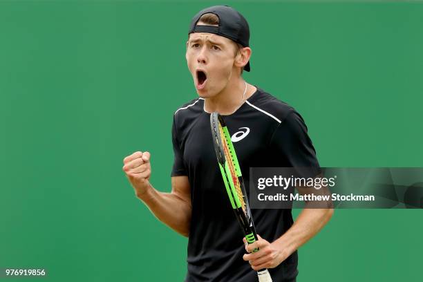 Alex De Minaur of Australia celebrates winning the first set during his men's singles final match against Dan Evans of Great Britain on Day Nine of...