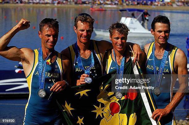 Simon Burgess, Anthony Edwards, Darren Balmforth and Robert Richards of Australia celebrate their silver medal during the Men's Lightweight Coxless...